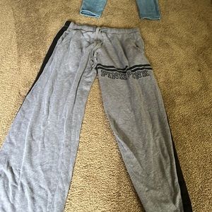 Sweatpants grey with black stripes and black lettering